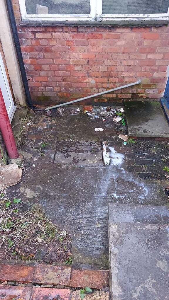 Blocked drain repair outside a property in Derby by Drain 2 Drain Ltd.