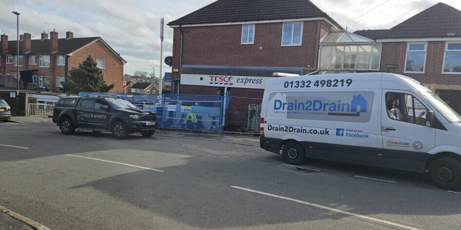 Drain 2 Drain Ltd van repairing Tesco Express drainage in Derby.